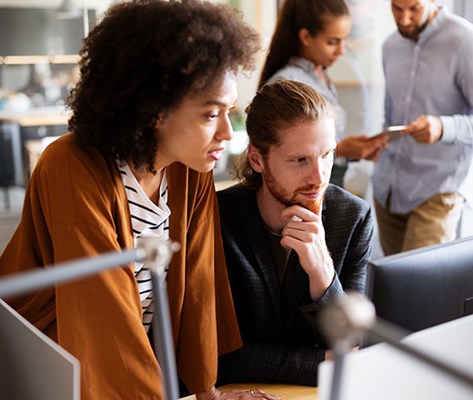 coworkers investigating the impact of their nation seo services