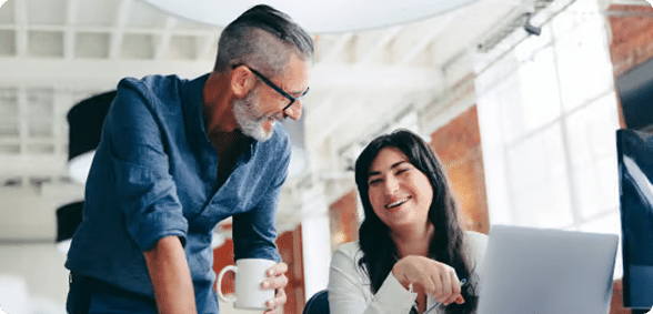 two coworkers happy about lead flow thanks to b2b seo