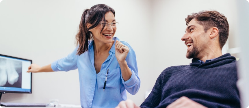 dentist happy to see a new patient who found her via her healthcare seo agency's campaign