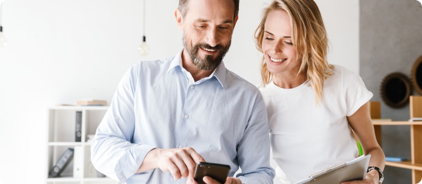 consumers checking a product on a mobile device