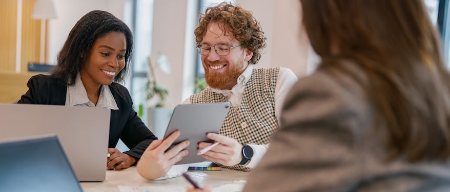 3 coworkers excited about seo improvements leading to increased demo requests
