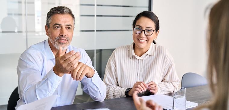 A group of people discusses the success of their enterprise SEO strategy.
