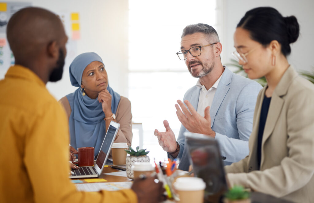 A group of coworkers talk about how to choose the right technical SEO agency.